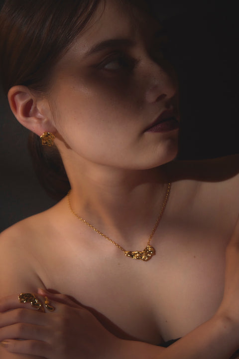 Pluto Rebirth pierced earrings Black