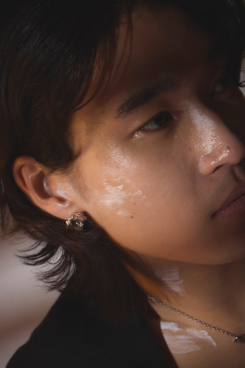 Pluto Rebirth pierced earrings Black