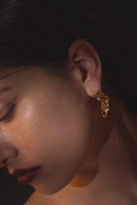 Pluto Rebirth pierced earrings Black