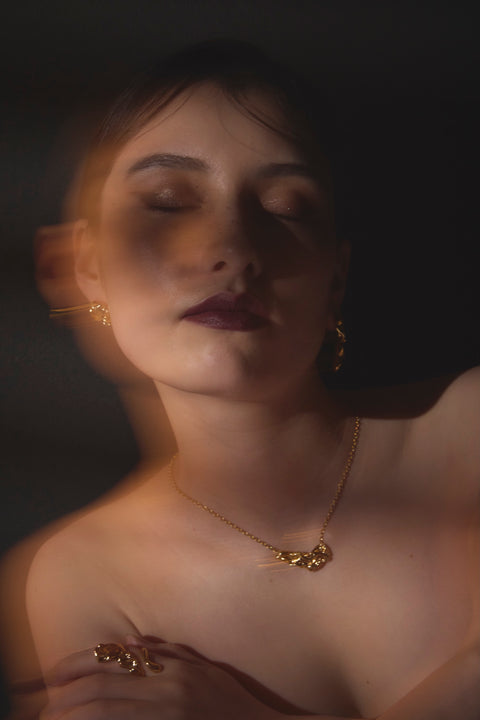 Pluto Rebirth pierced earrings Black