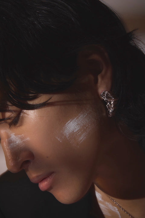 Pluto Rebirth pierced earrings Black